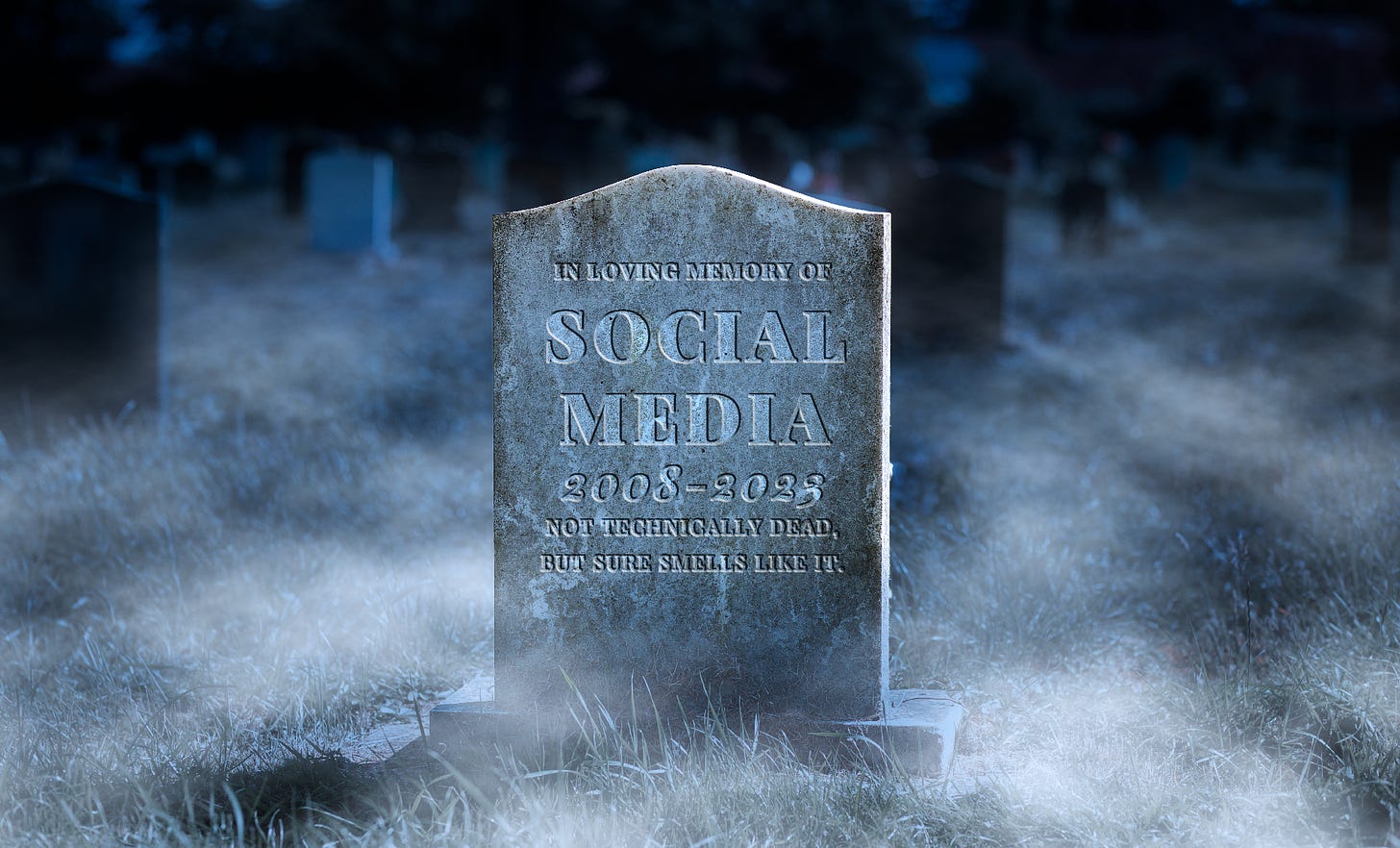 A graveyard in the cold winter moonlight. headstone reads "IN LOVING MEMORY OF SOCIAL MEDIA 2008-2023. NOT TECHNICALLY DEAD, BUT SURE SMELLS LIKE IT". Cold mist crawls across the frozen ground and the whole thing is hella spooky.